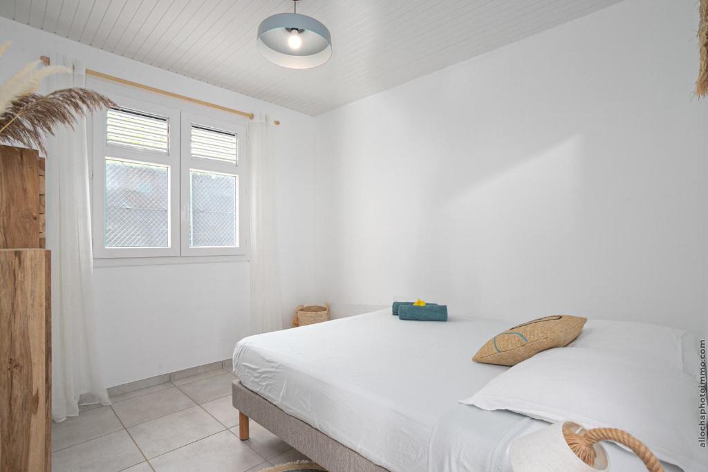 Postel nebo postele na pokoji v ubytování Villa Kaliemma