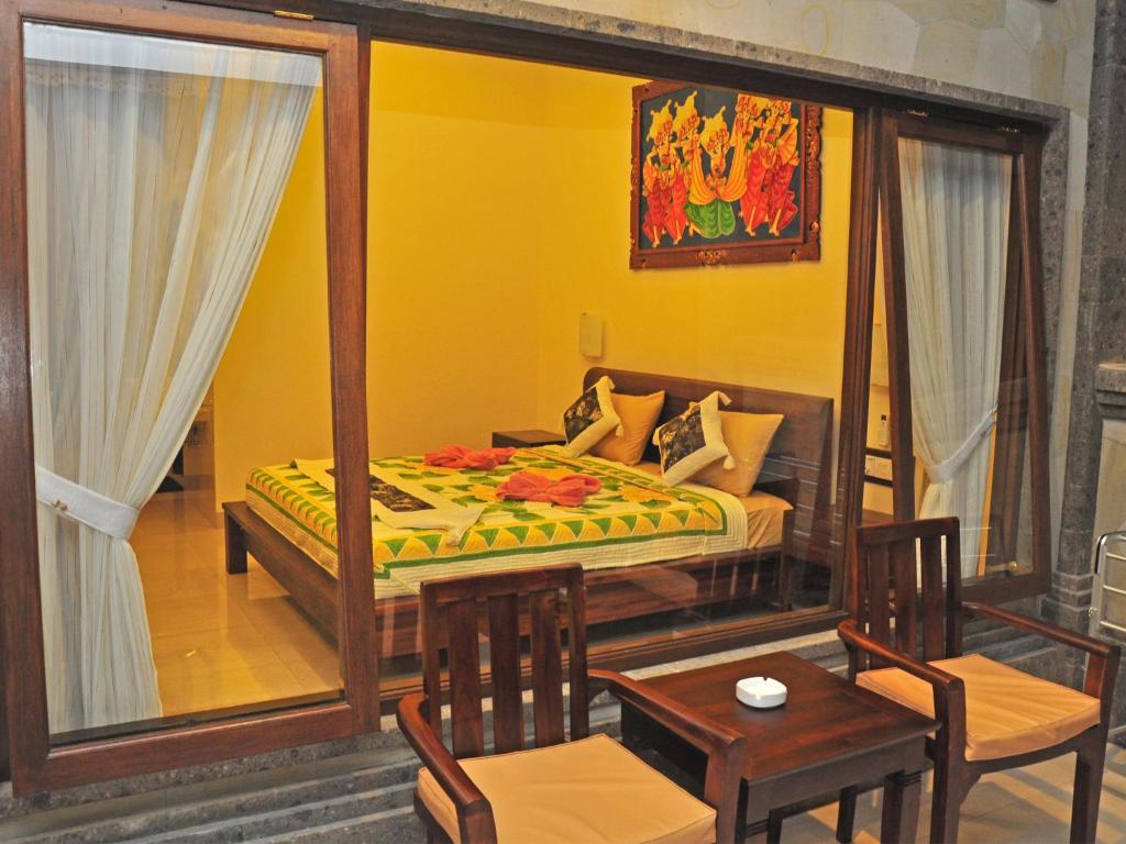 Postel nebo postele na pokoji v ubytování Bucu Guest House