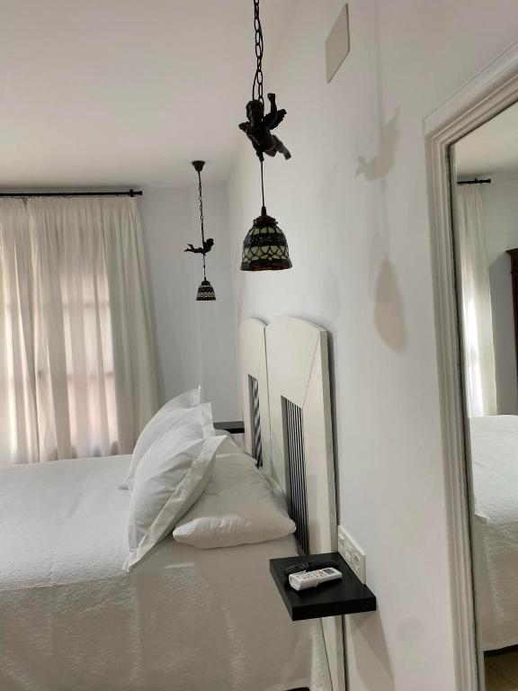 Postel nebo postele na pokoji v ubytování Apartamento El Ángel 1