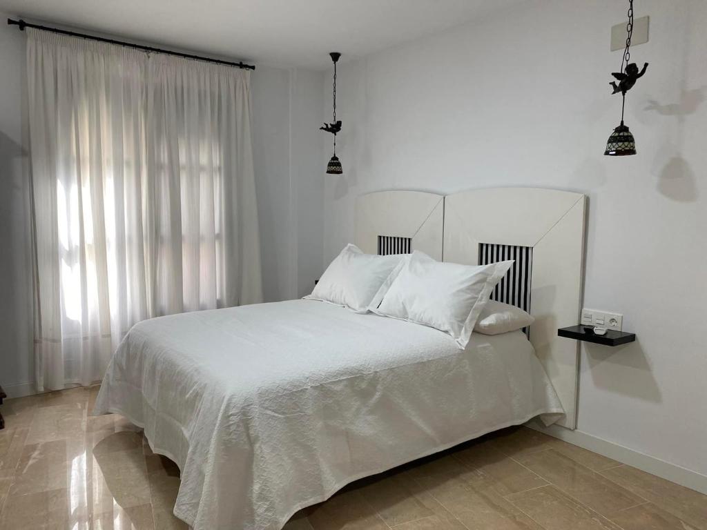 Postel nebo postele na pokoji v ubytování Apartamento El Ángel 1