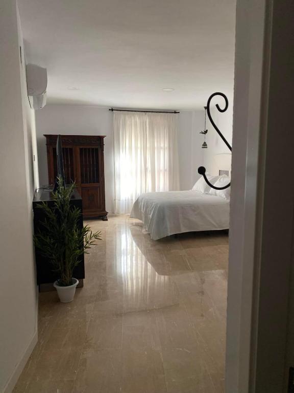 Postel nebo postele na pokoji v ubytování Apartamento El Ángel 1