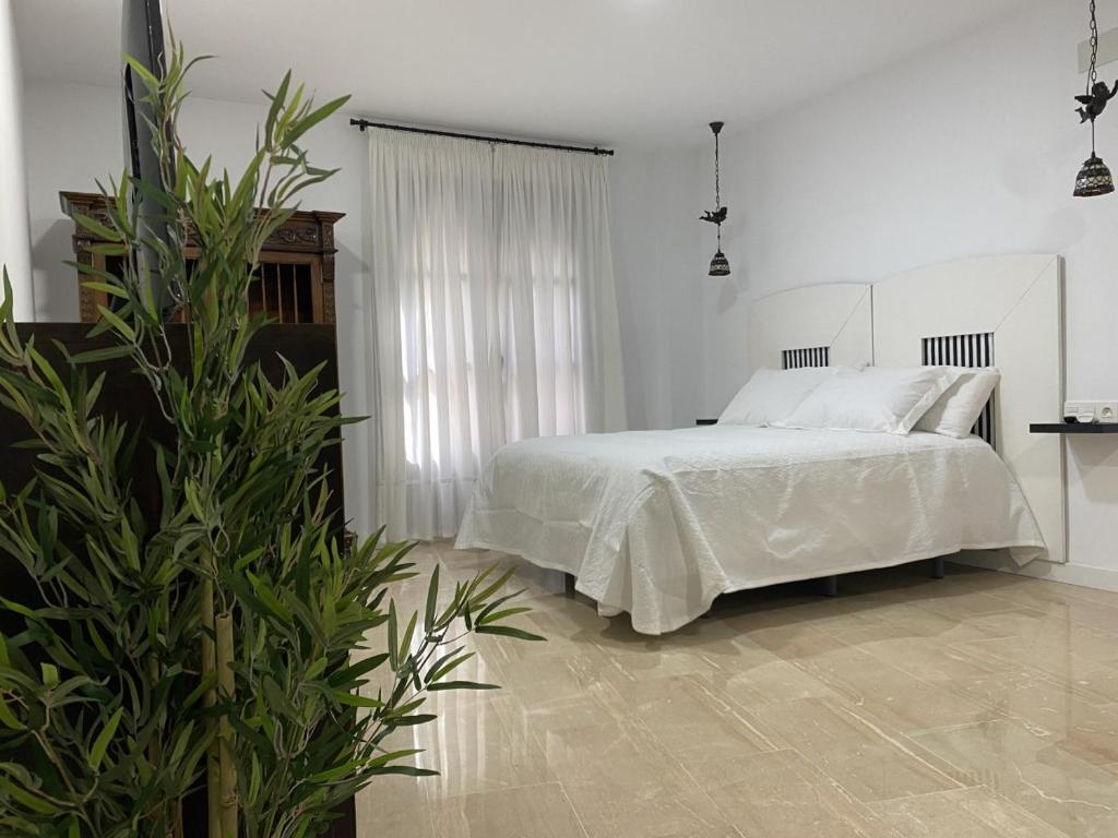 Postel nebo postele na pokoji v ubytování Apartamento El Ángel 1