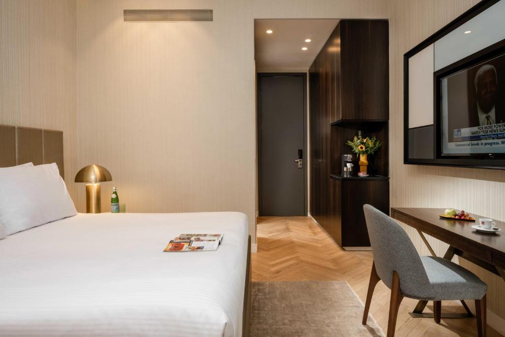 Postel nebo postele na pokoji v ubytování VERT Jerusalem by AFI Hotel