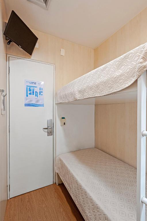 FAST SLEEP Guarulhos by Slaviero Hotéisにあるベッド
