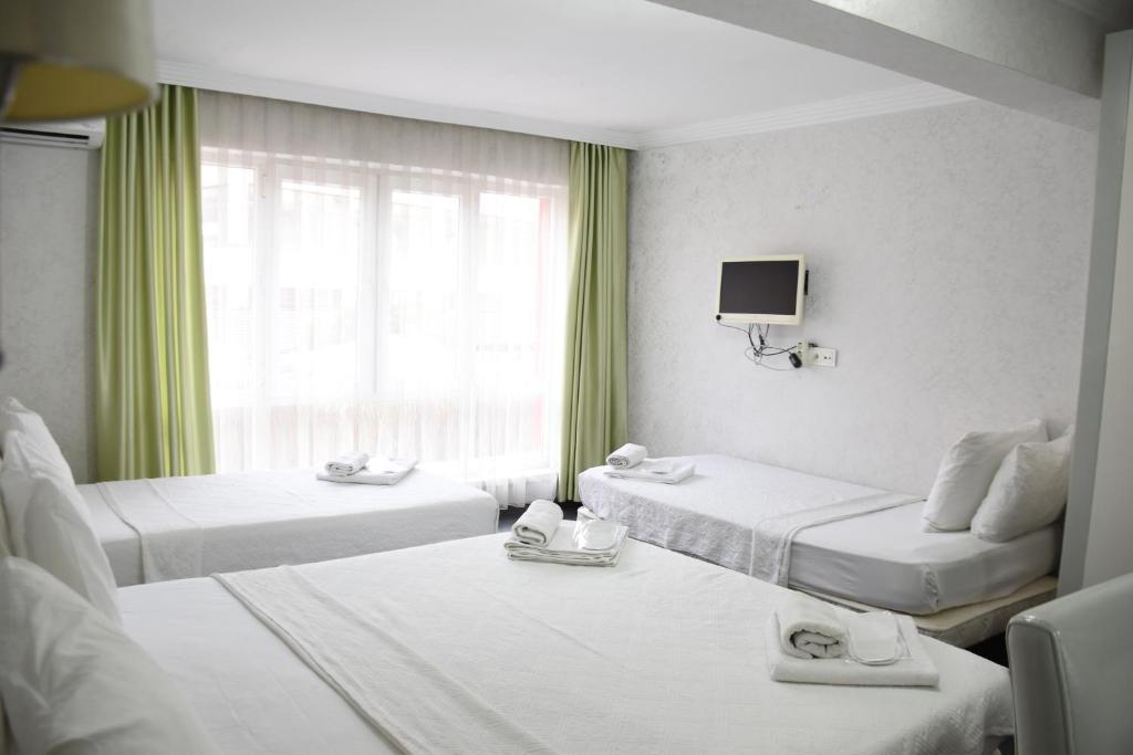 تصویر اتاق‌های Yalçın Otel - تصویر ۲