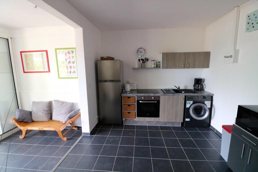 Kuchyň nebo kuchyňský kout v ubytování RESIDENCE COCO