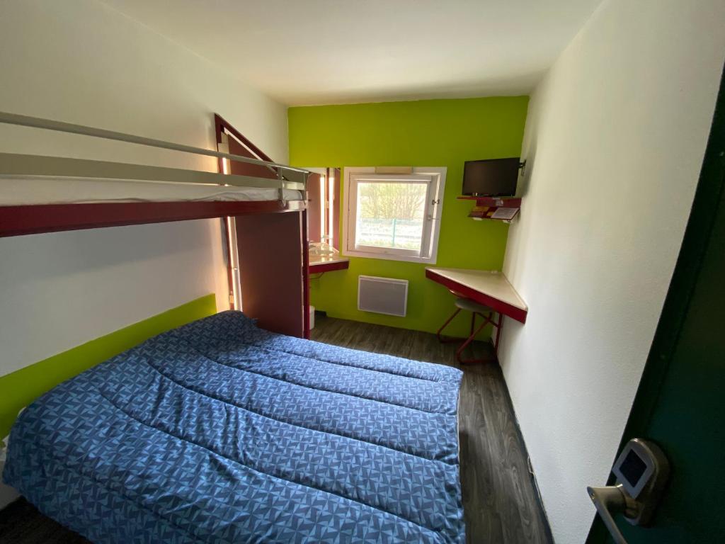 Postel nebo postele na pokoji v ubytování Class'Eco Chambly