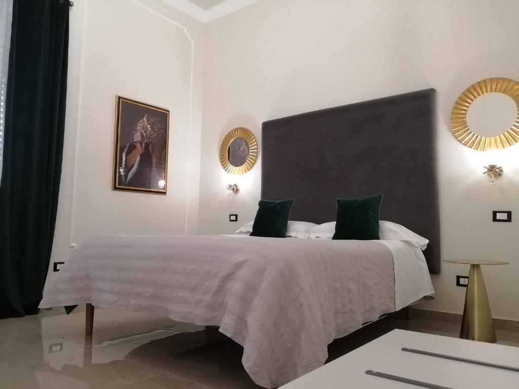 Posteľ alebo postele v izbe v ubytovaní Amaris
