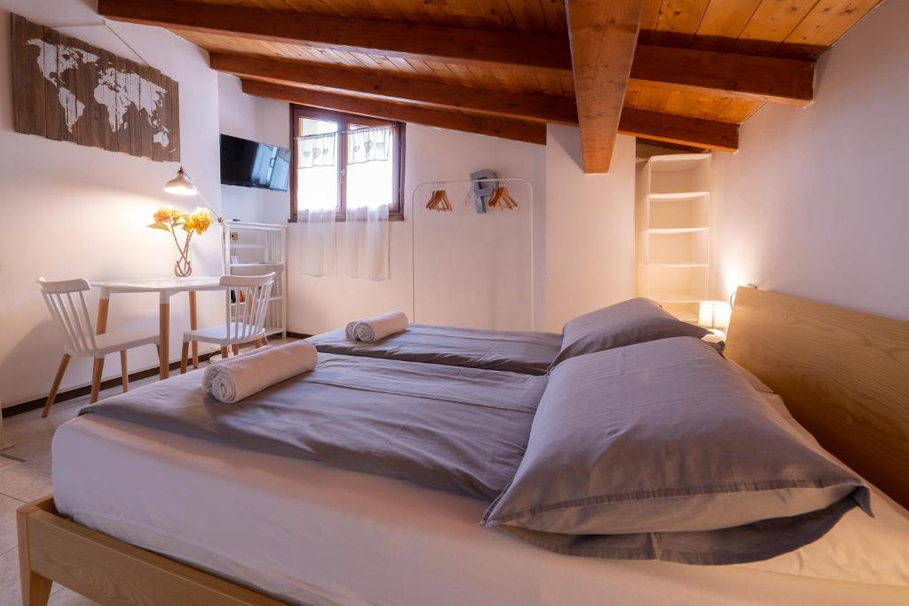 Ένα ή περισσότερα κρεβάτια σε δωμάτιο στο Residence Trieste