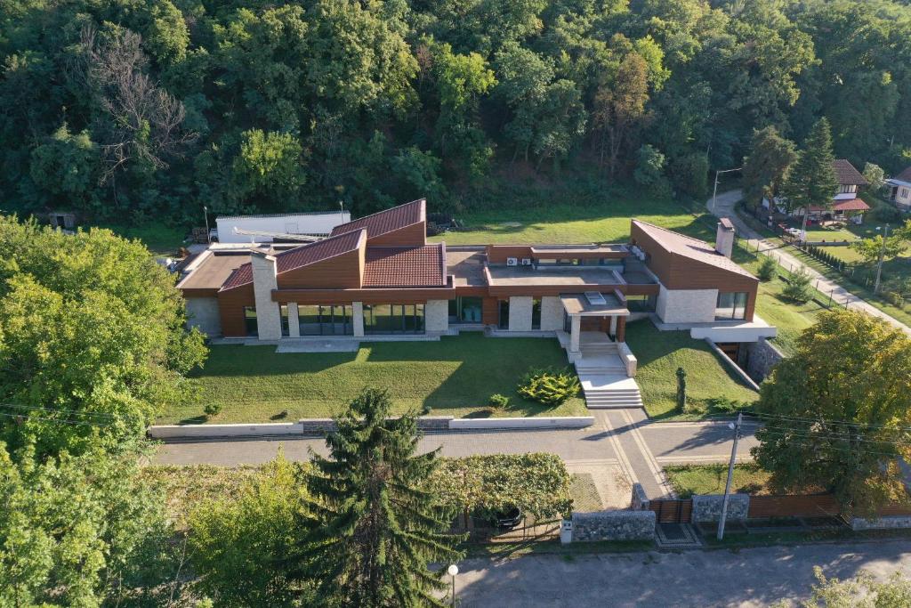 an aerial view of a house on a hill at Villa Luxury Rooms - Wine Resort in Smederevo