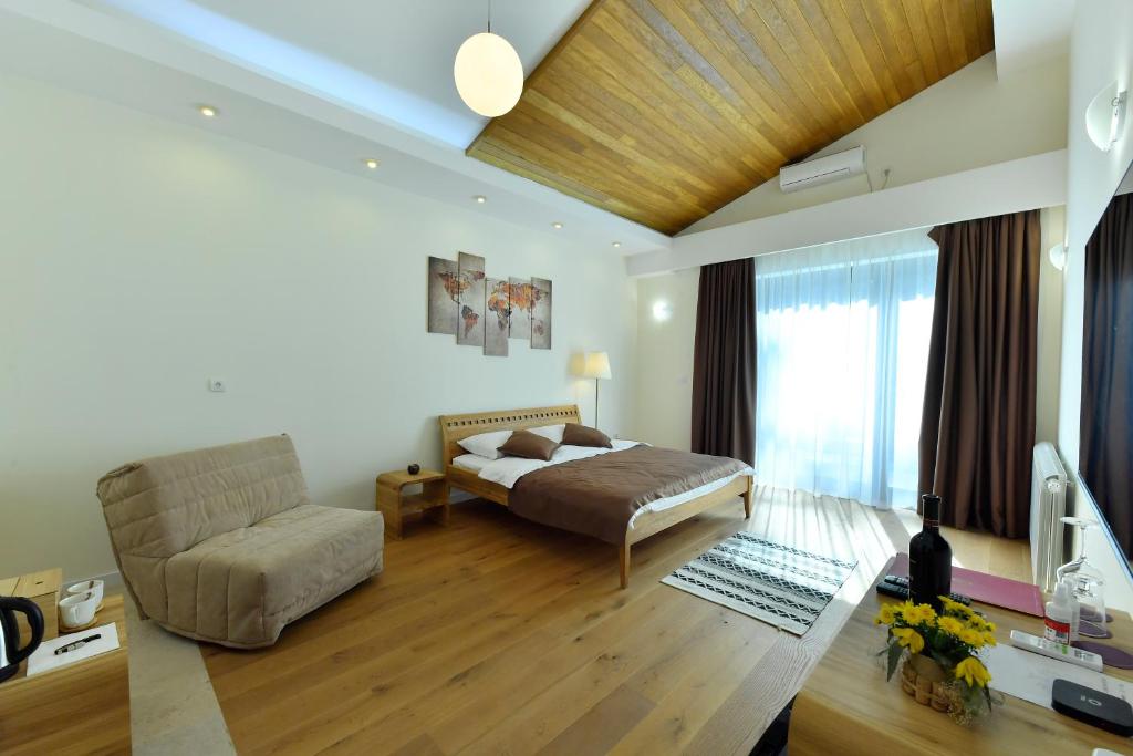 Postel nebo postele na pokoji v ubytování Villa Luxury Rooms - Wine Resort