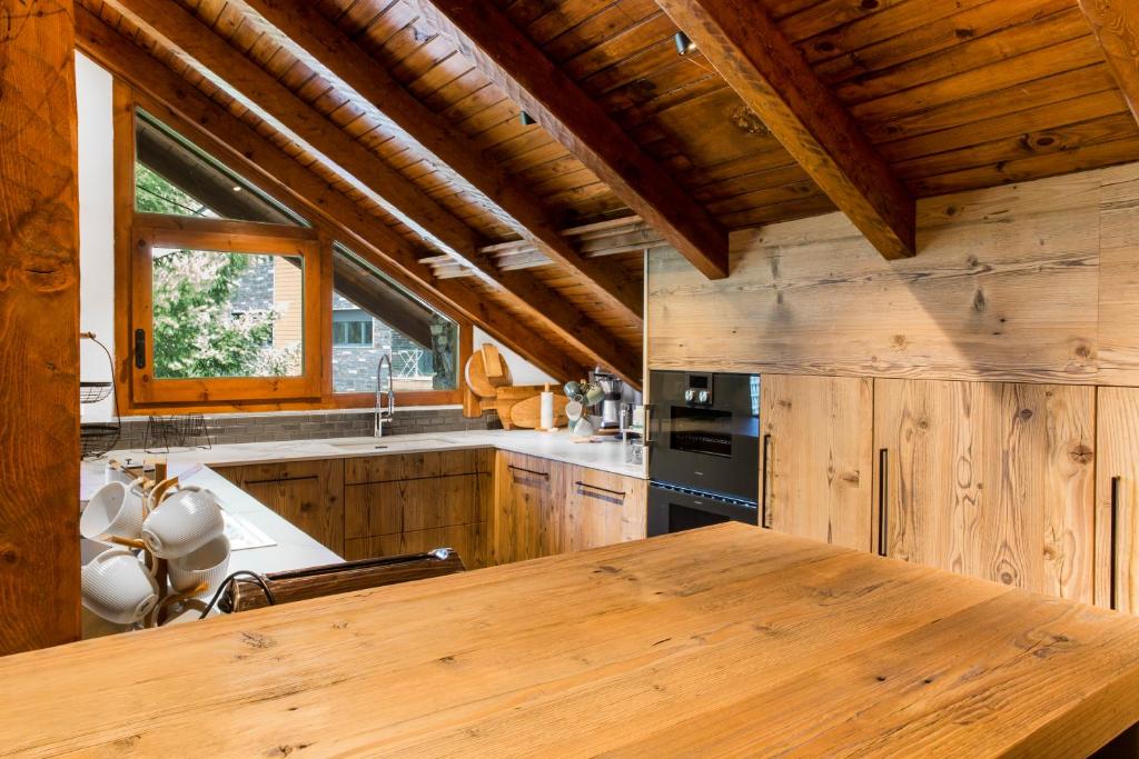 Kuchyň nebo kuchyňský kout v ubytování Pleta del Tarter Lodge