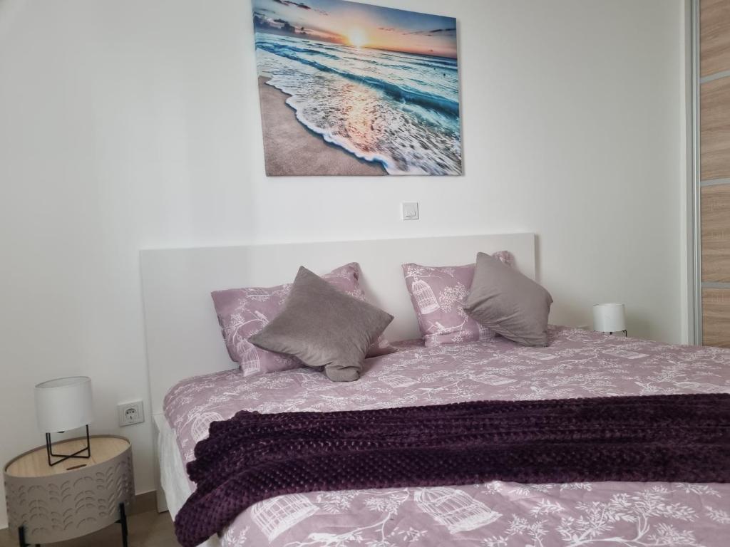 Postel nebo postele na pokoji v ubytování Sea spirit Šimuni
