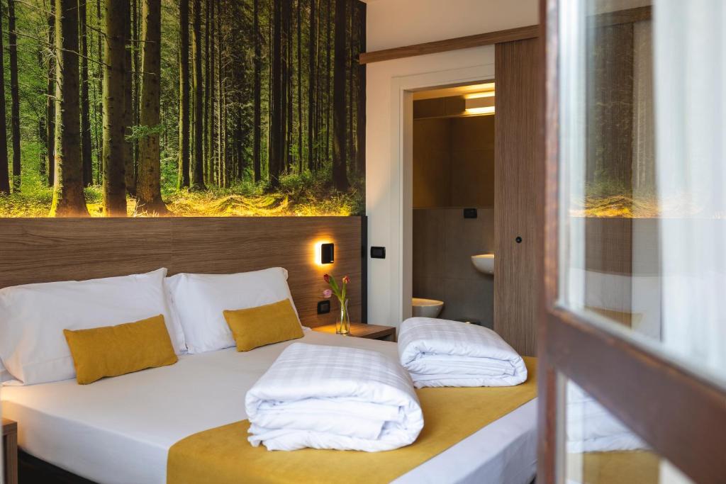 Posteľ alebo postele v izbe v ubytovaní Hi Hotels Trento - Wellness & Spa Adults Only