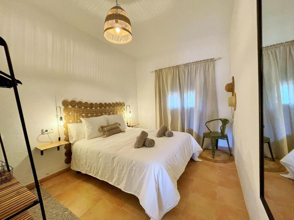 Postel nebo postele na pokoji v ubytování Apartamentos Carabela