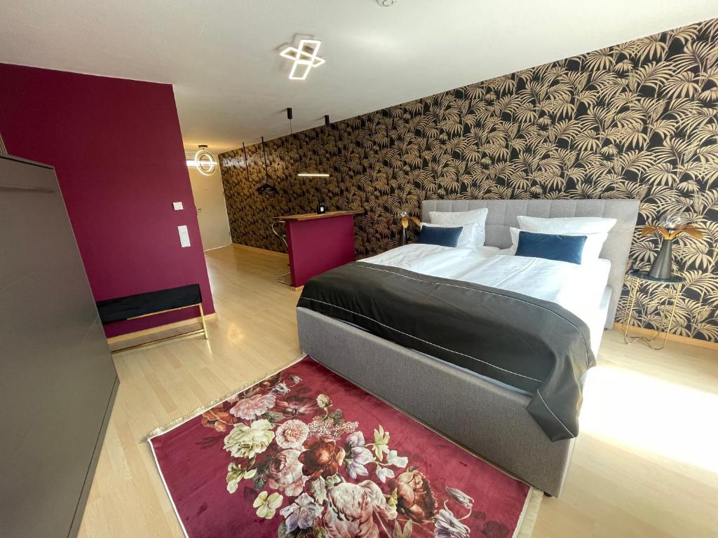 Katil atau katil-katil dalam bilik di Design Apartment Catch Me If You Can