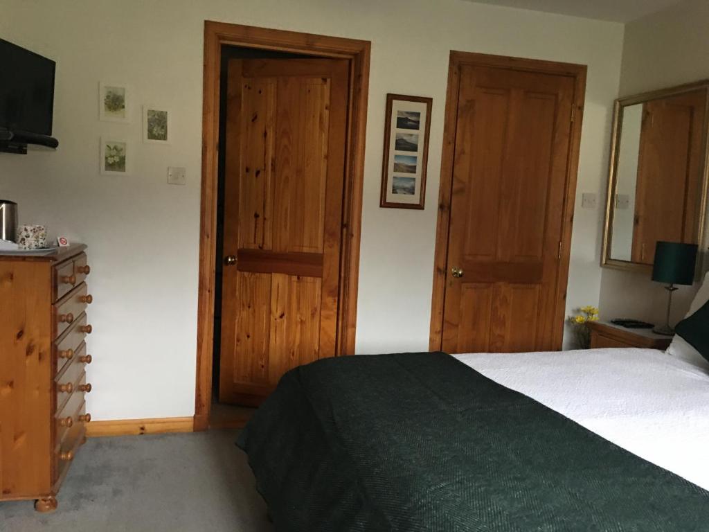 Postel nebo postele na pokoji v ubytování Taigh Pa