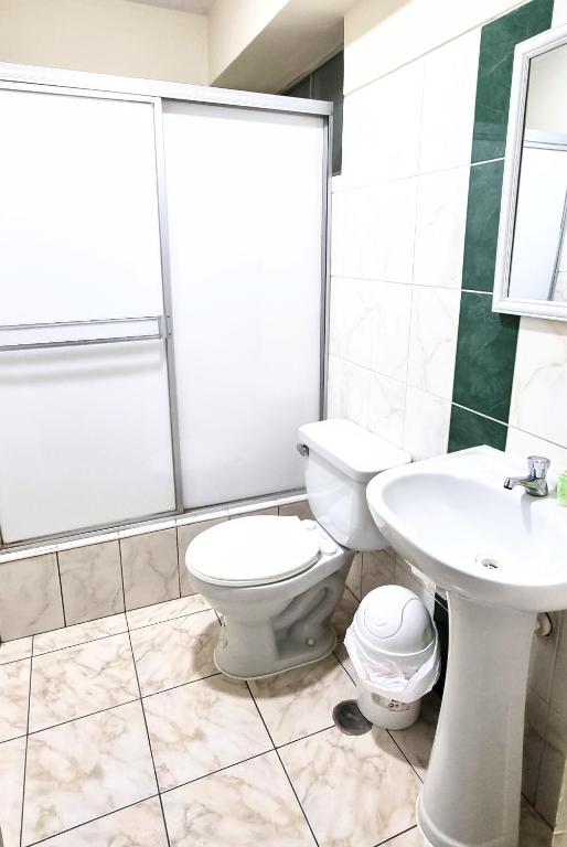Koupelna v ubytování Hotel Taurus