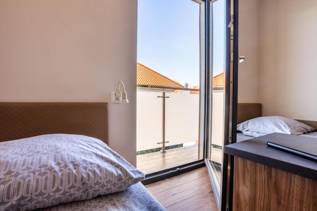Postel nebo postele na pokoji v ubytování NoclegiJarocin Bed & Breakfast