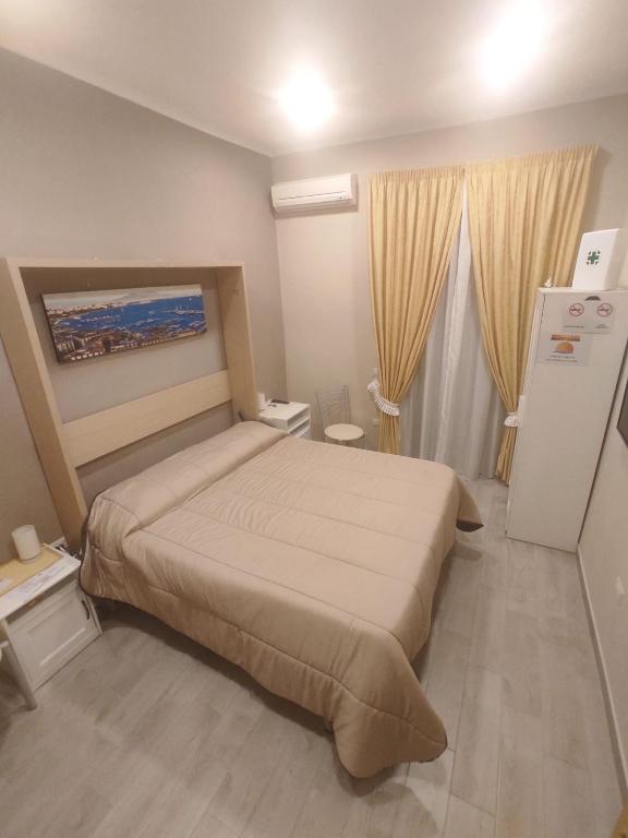 A bed or beds in a room at Sunrise 15