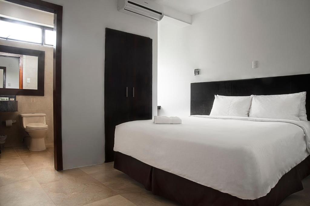 Postel nebo postele na pokoji v ubytování Hotel La Ría Playas