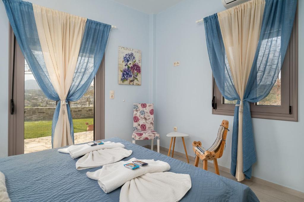 Postel nebo postele na pokoji v ubytování Villa Jodi