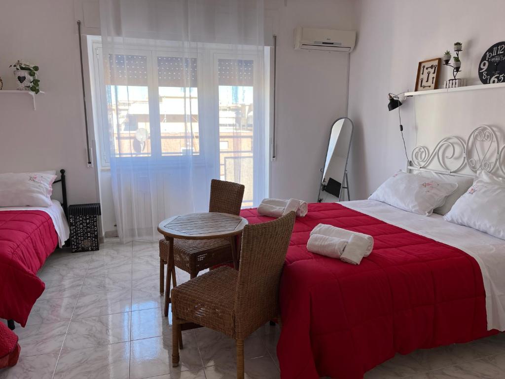 Postel nebo postele na pokoji v ubytování Eder Home A un passo dal Teatro Greco