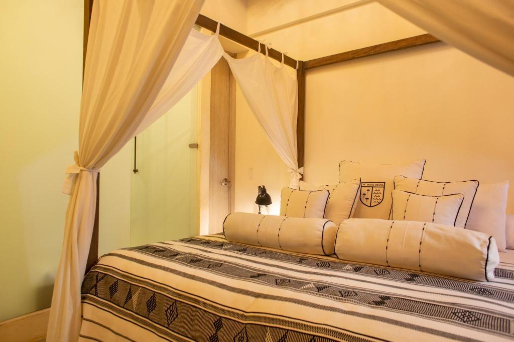 Postel nebo postele na pokoji v ubytování Casa de Alba Hotel Boutique
