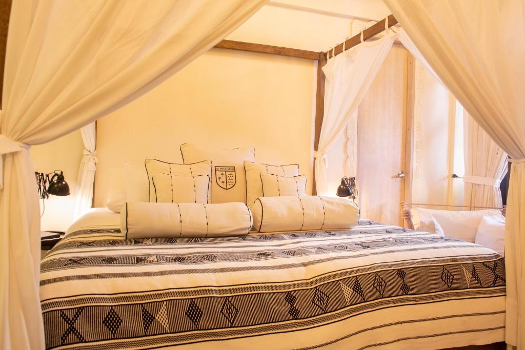 Postel nebo postele na pokoji v ubytování Casa de Alba Hotel Boutique