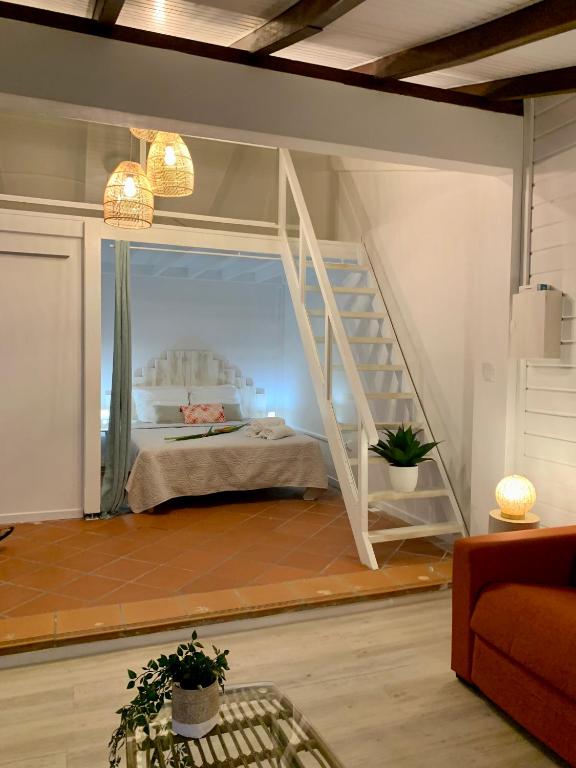 Uma cama ou camas num quarto em SOMPTUEUX DUPLEX SUR LA ROUTE DES PLAGES