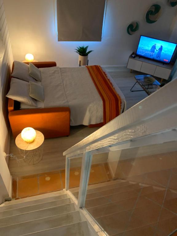 Uma cama ou camas num quarto em SOMPTUEUX DUPLEX SUR LA ROUTE DES PLAGES