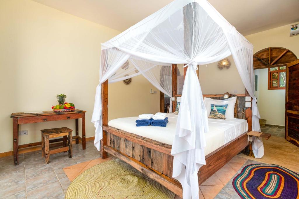 Postel nebo postele na pokoji v ubytování Marafiki Beach Hotel & SPA