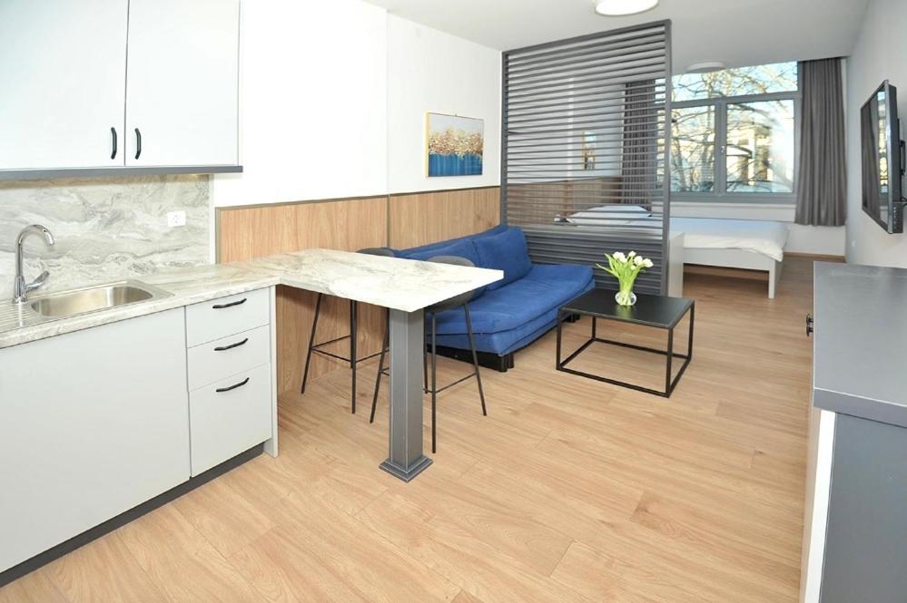 Кухня або міні-кухня у Rondo Premium Apartments