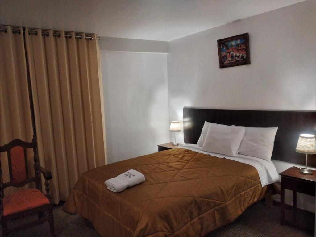 Postel nebo postele na pokoji v ubytování Pukara House