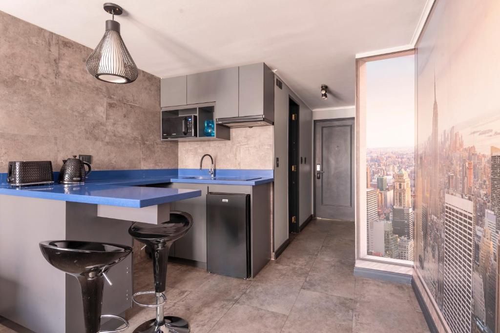 Kuchyň nebo kuchyňský kout v ubytování Design Tech Comfort & Location