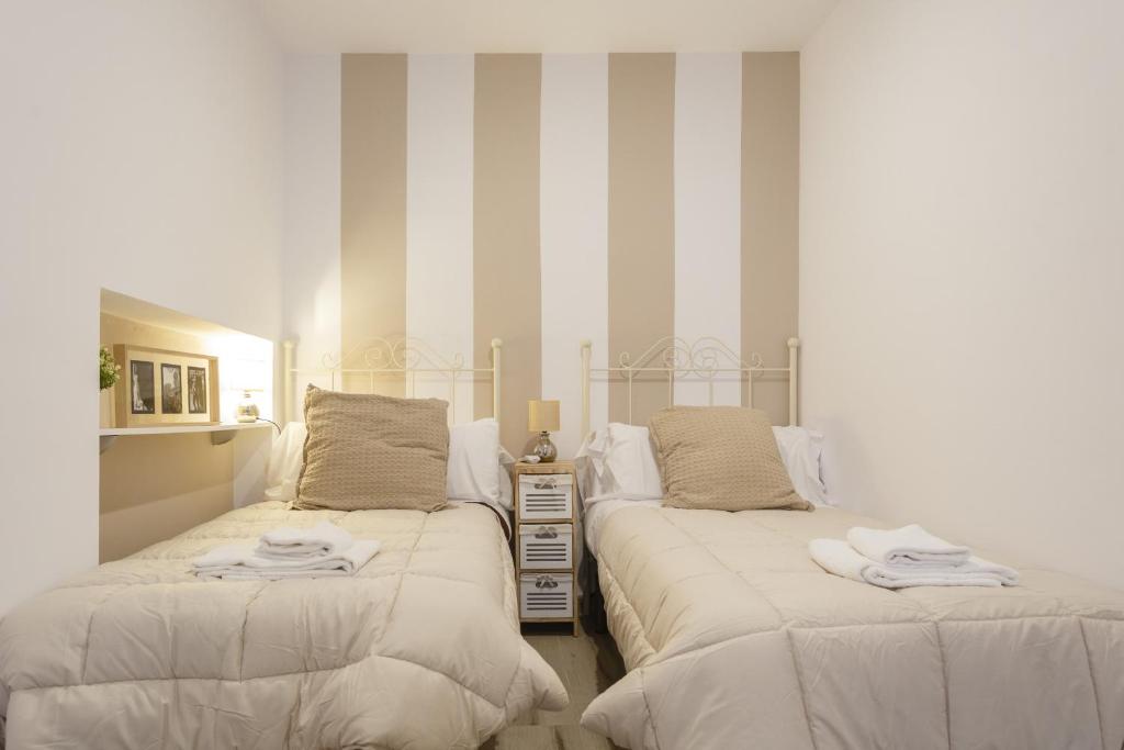 Postel nebo postele na pokoji v ubytování Catedral VIEW Apartment by Cadiz4Rentals