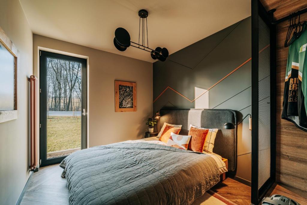 Posteľ alebo postele v izbe v ubytovaní Apartament Riders Lodge Bielsko-Biała Jeżynowa