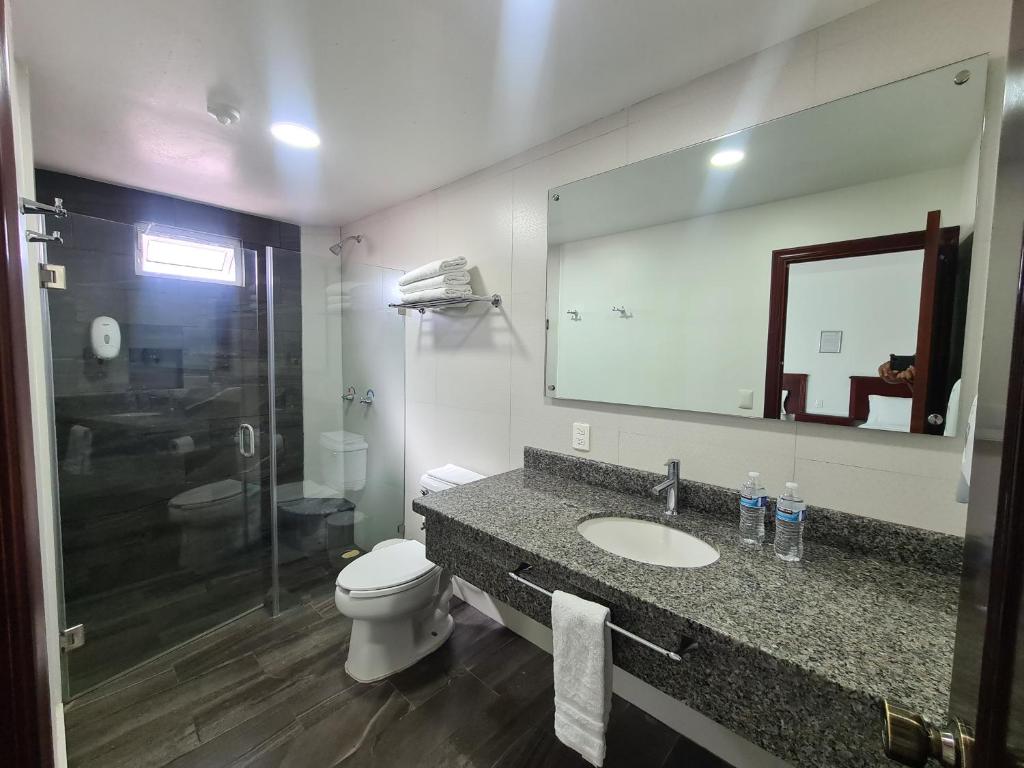 Koupelna v ubytování HOTEL FINA INN