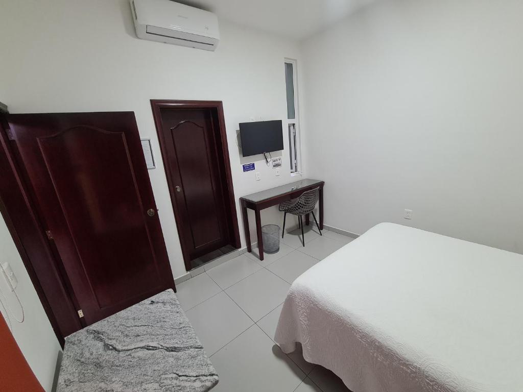 TV a/nebo společenská místnost v ubytování HOTEL FINA INN