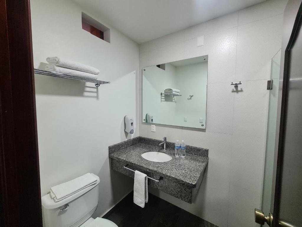 Koupelna v ubytování HOTEL FINA INN