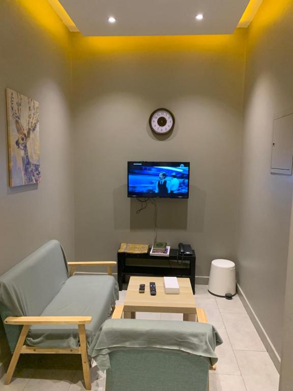 TV a/nebo společenská místnost v ubytování Al Rawdha Hotel Apartments