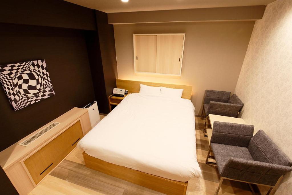 Postel nebo postele na pokoji v ubytování Think・Hotel・Think
