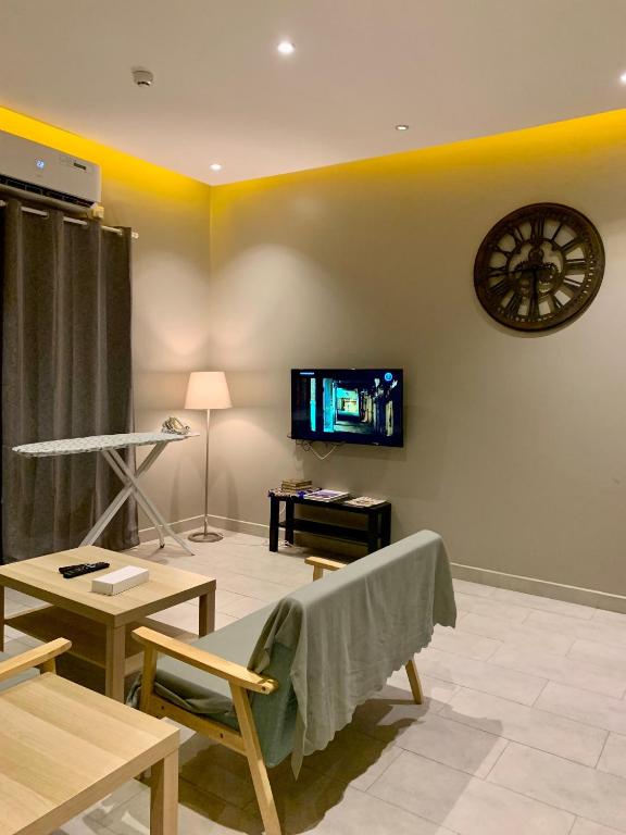 TV a/nebo společenská místnost v ubytování Al Rawdha Hotel Apartments