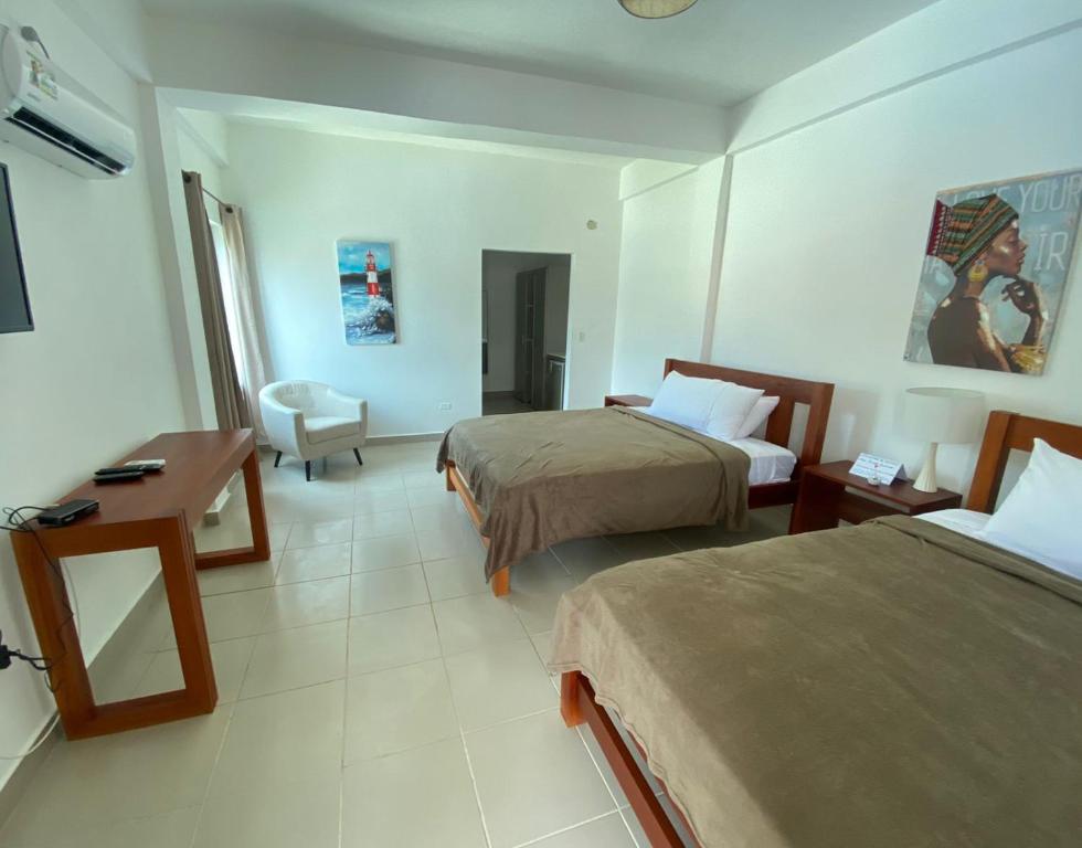 Postel nebo postele na pokoji v ubytování Hotel Candy Rose