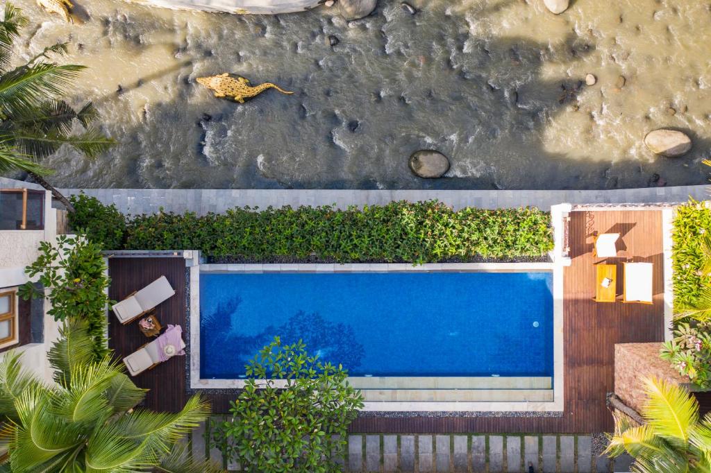 Bazén v ubytování Harsono Boutique Resort Bali nebo v jeho okolí