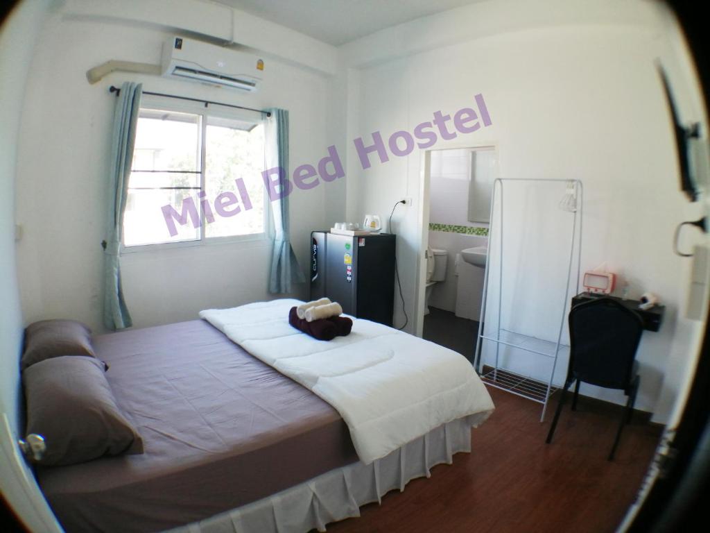 Postel nebo postele na pokoji v ubytování MIEL BED Hostel & Gallery