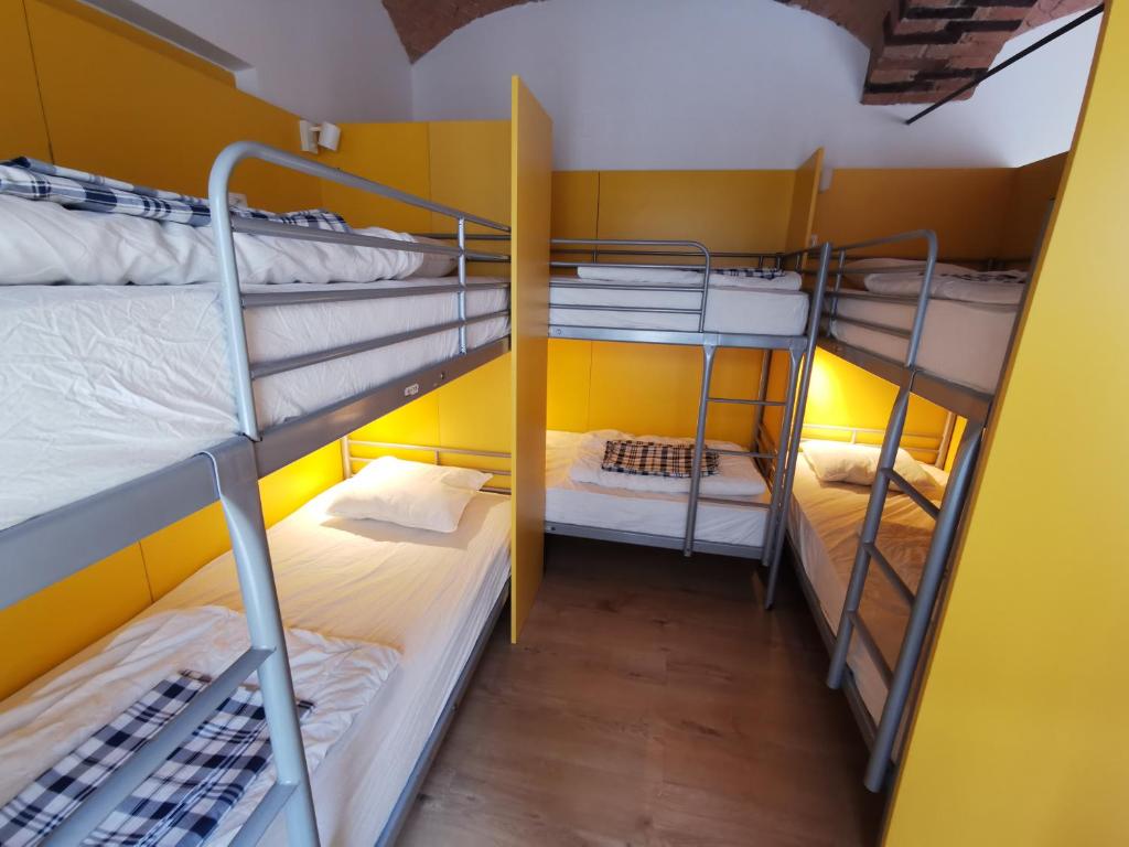 Postel nebo postele na pokoji v ubytování H2O Hostel
