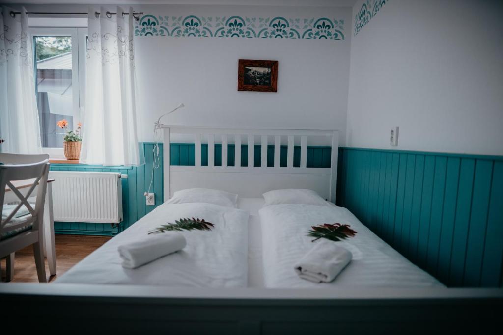 Postel nebo postele na pokoji v ubytování Penzion Račí údolí