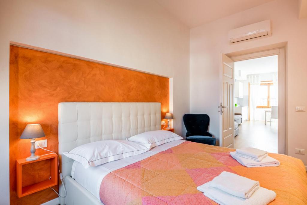Ένα ή περισσότερα κρεβάτια σε δωμάτιο στο Santa Maria Novella Cozy Flat