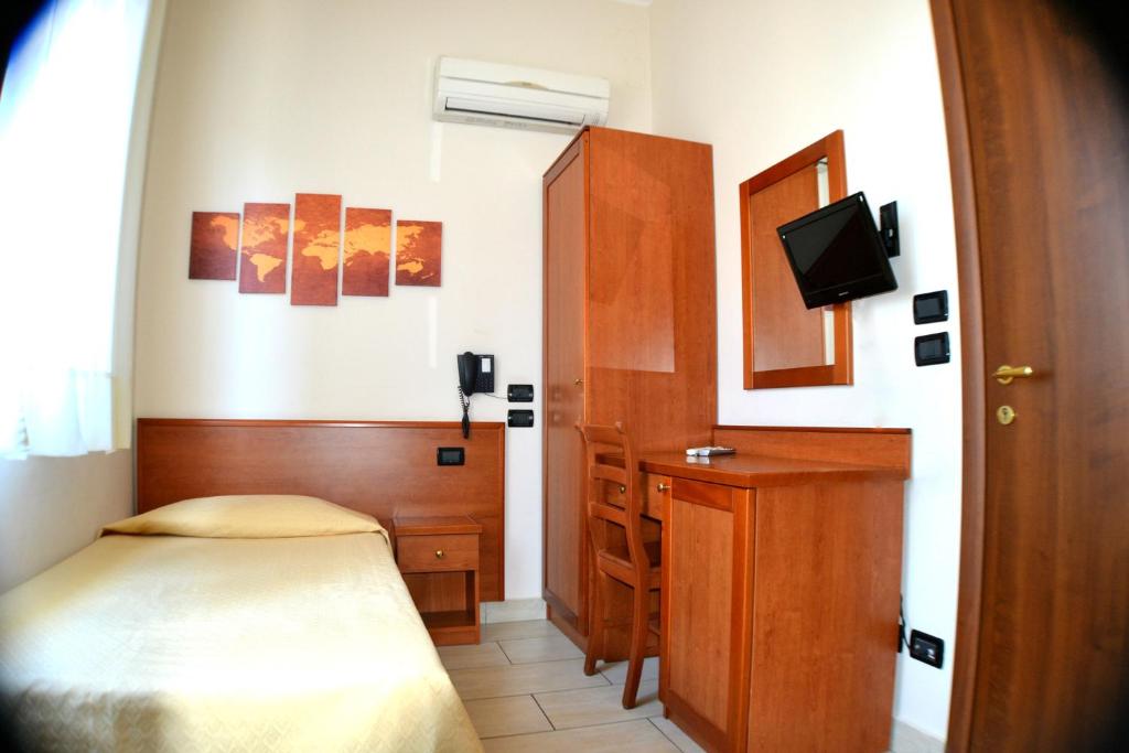 Postel nebo postele na pokoji v ubytování B&B Centrale Affittacamere